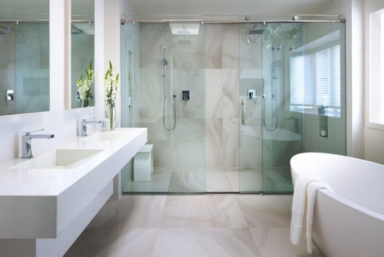 contemporary bathroom with glass shower and freestanding tub