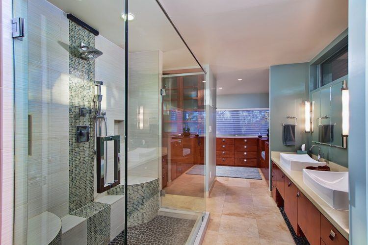 modern glass enclosed shower with accent tiles