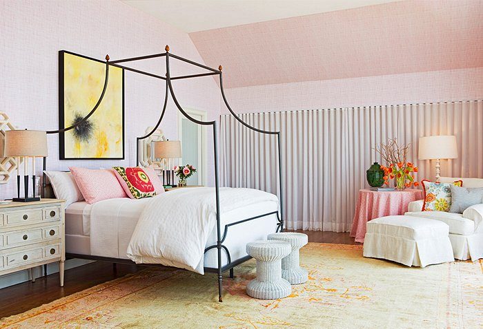 pink bedroom with canopy bed