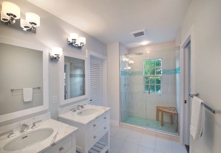 beautiful bathroom with shower accent tile