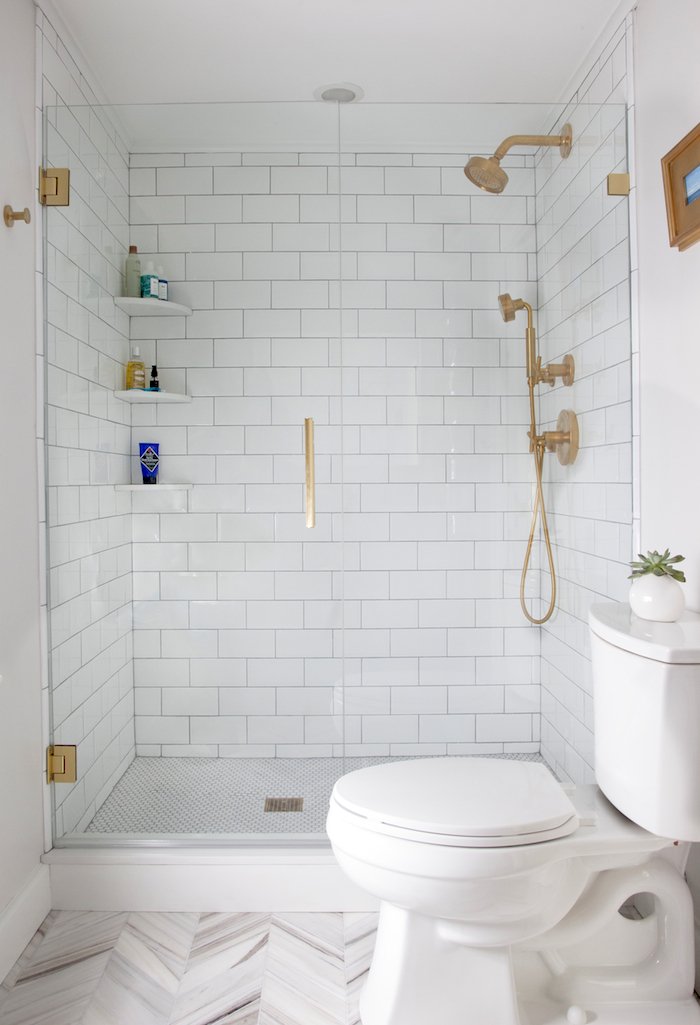 small bathroom with gold accents