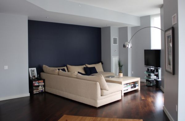 living room with cream colored couch