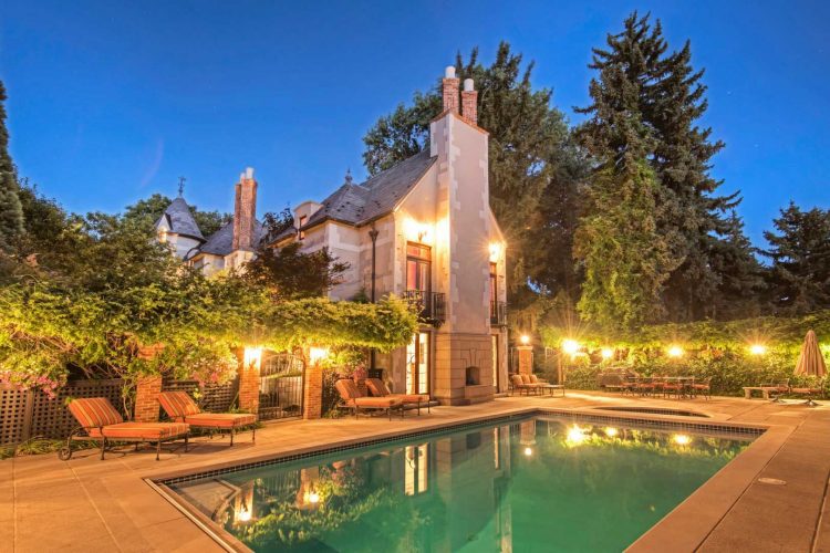 backyard view of house and swimming pool