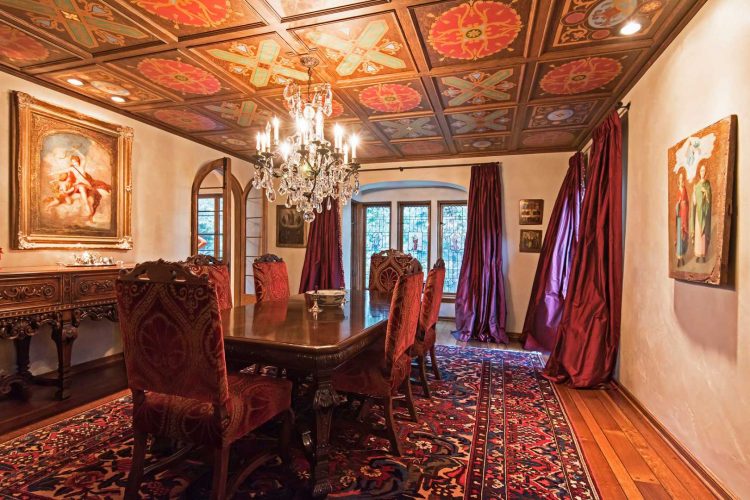 formal dining room with chandelier 