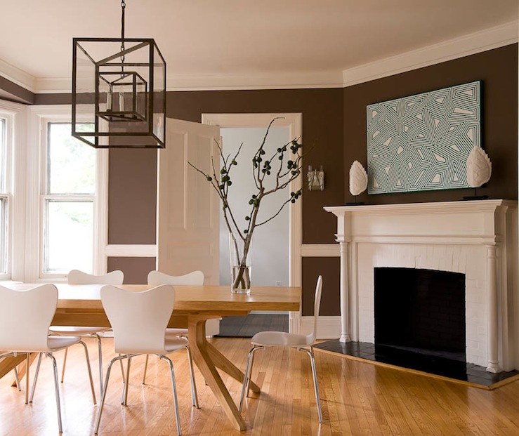 trendy modern dining room with contemporary chandelier 