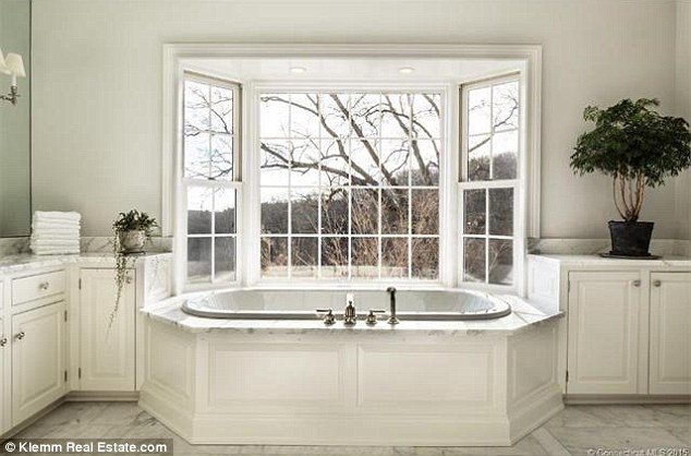 simple bathroom with bay window