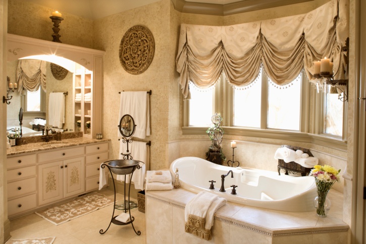 large luxury bathroom with gold trim