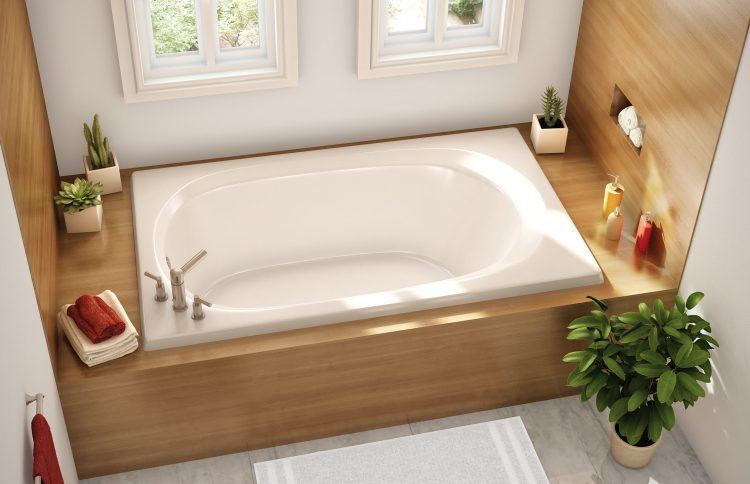 beautiful bathroom with white drop in tub