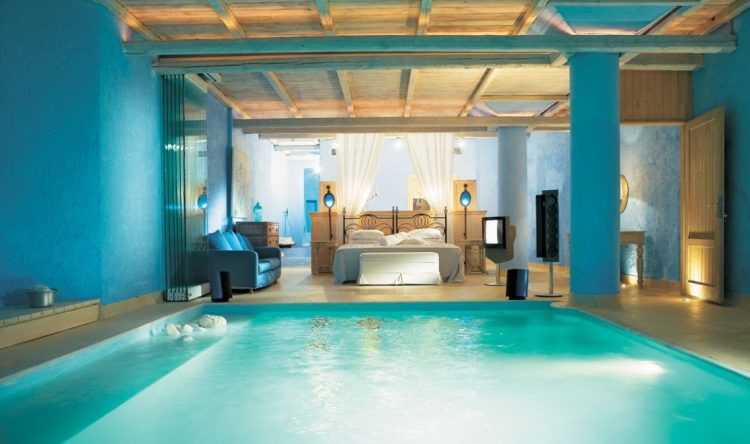 Blue Bedroom with a Pool