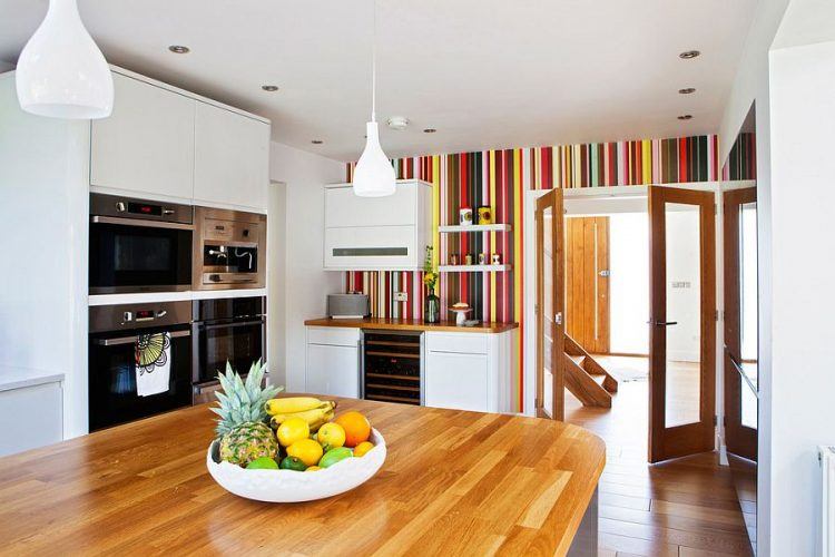 kitchen with colorful striped accent wall