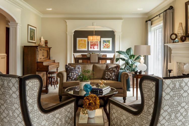 crown molding in living room with rug