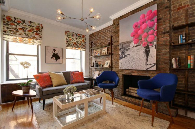 living room with exposed brick wall