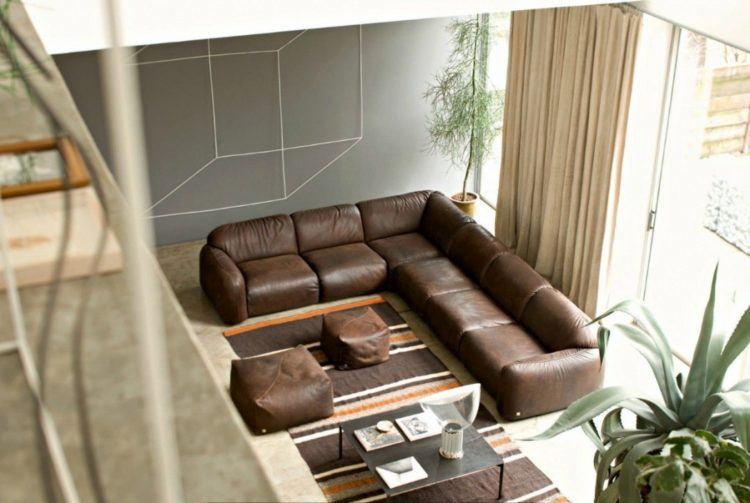 leather couch with leather ottomans