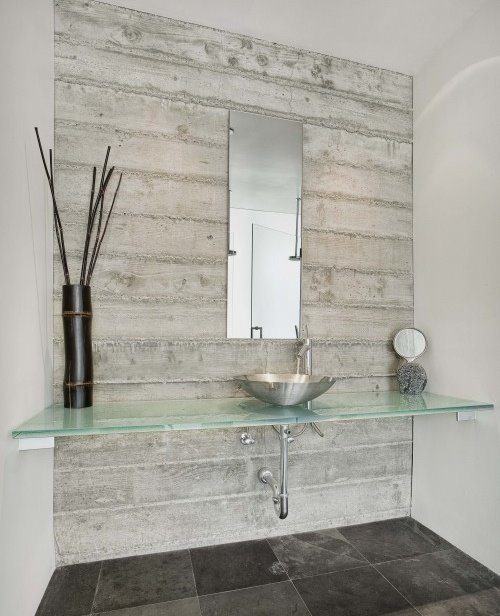 bathroom with floating glass counter