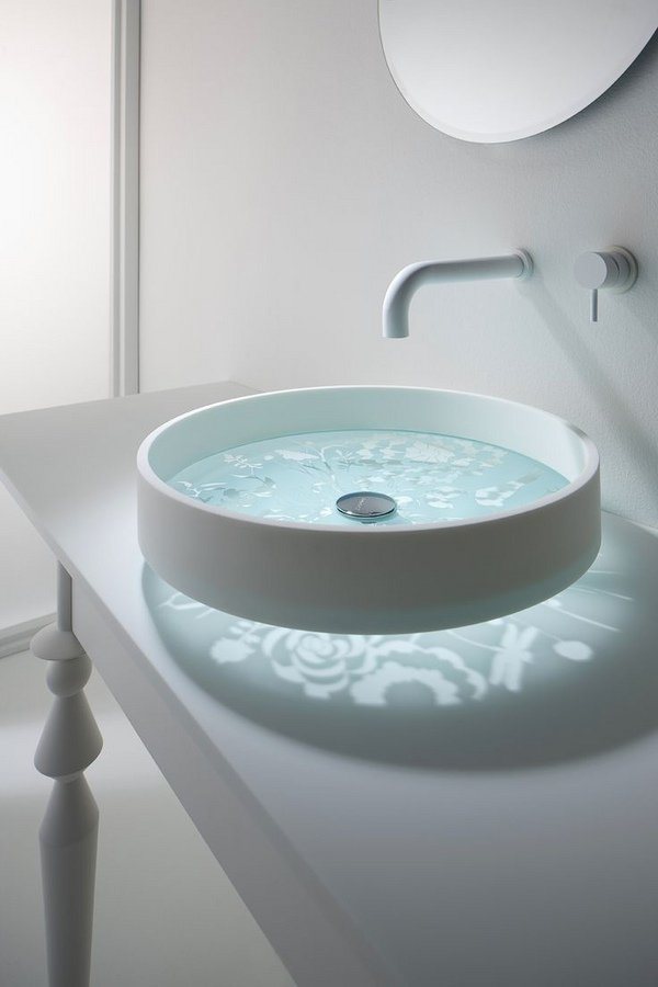 round glass vessel sink