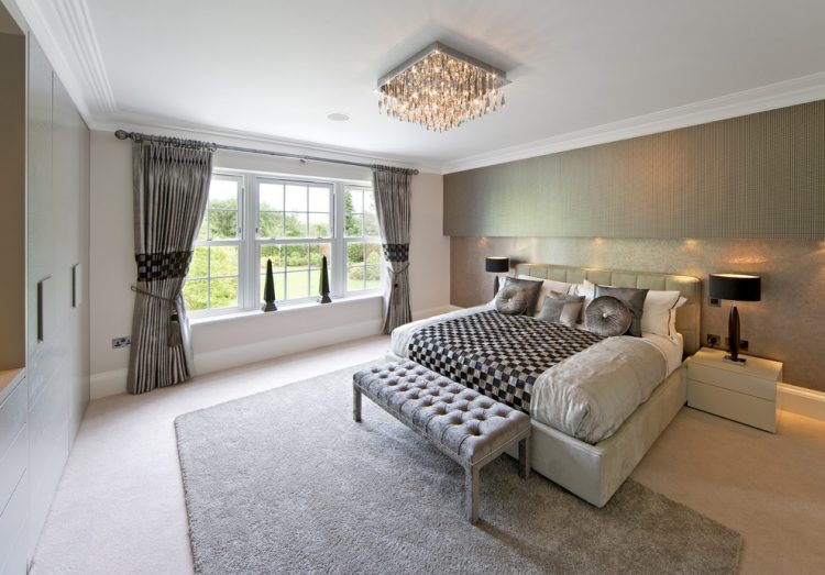 gray-bedroom-with-crystal-chandelier