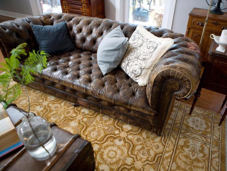 worn brown leather couch