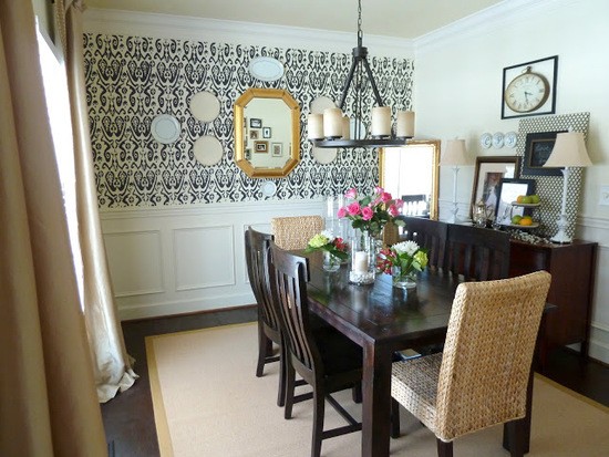 dining room with black and white accent wall