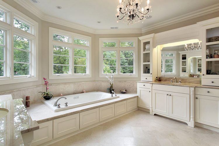 luxury master bathroom with chandelier 