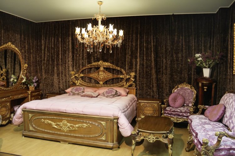 master-bedroom-with-gold-trim-chandelier