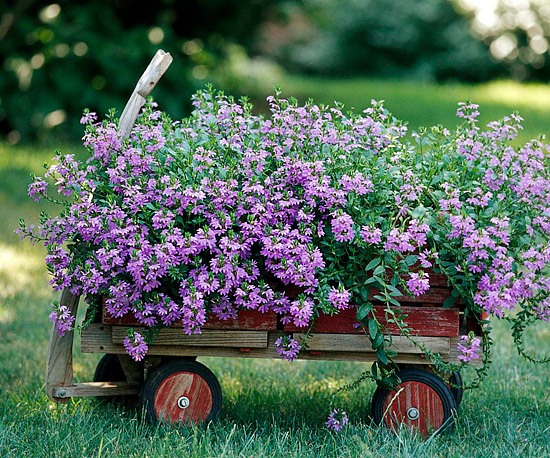 old wagon used for flower bed