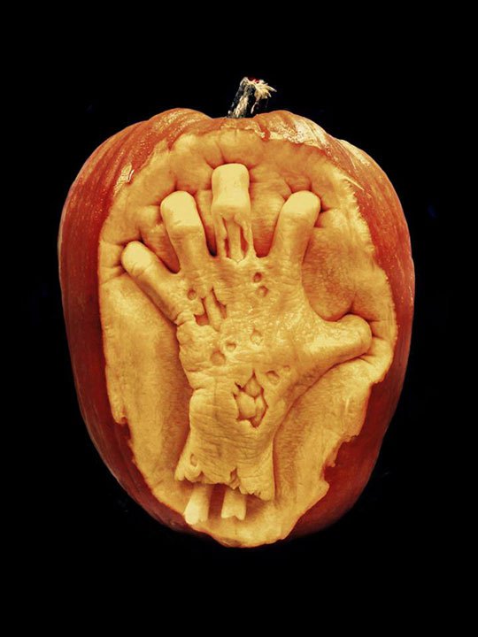 scary-hand-pumpkin-carving