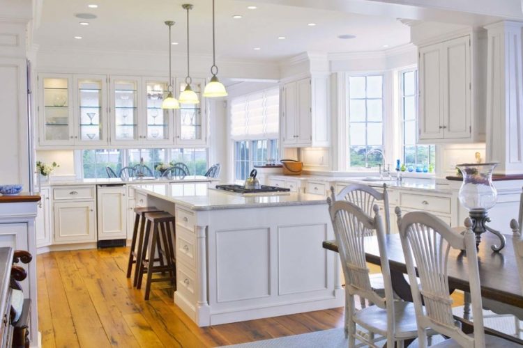 cool white kitchen with hardwood flooring