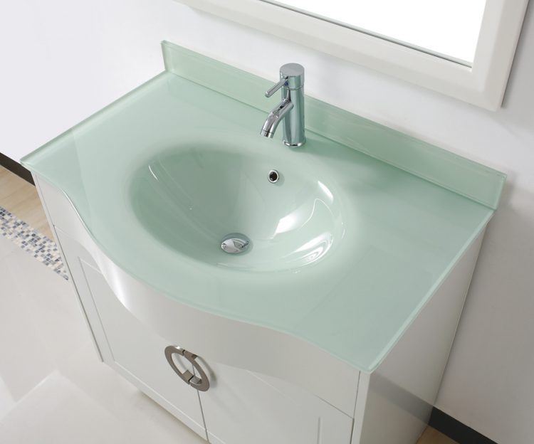 white bathroom with glass top vanity