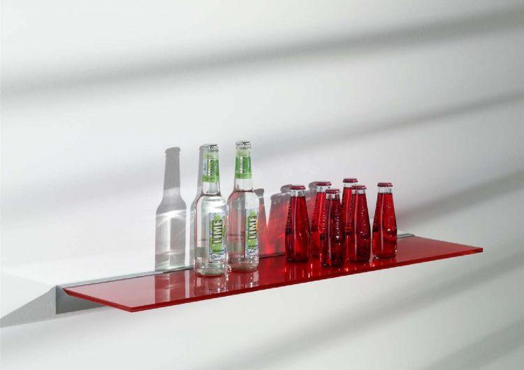 red glass shelving for bottles