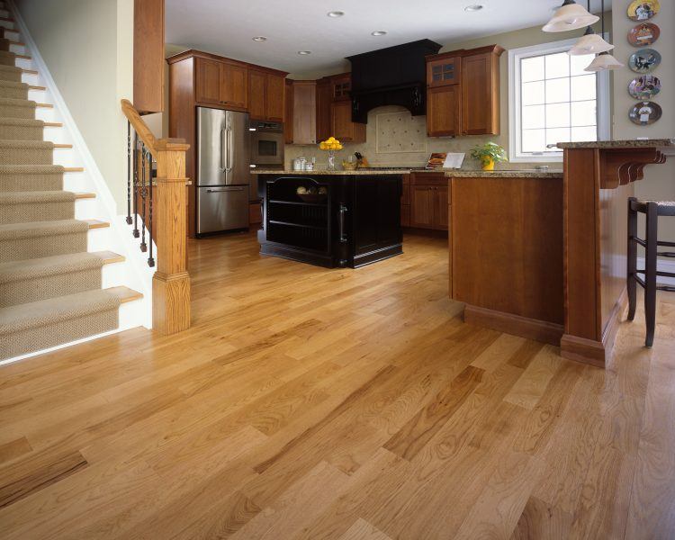 simple kitchen with light hardwood flooring