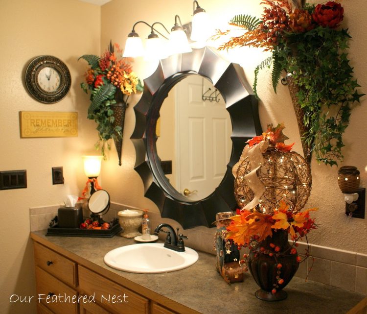 fall themed bathroom with orange accessories 