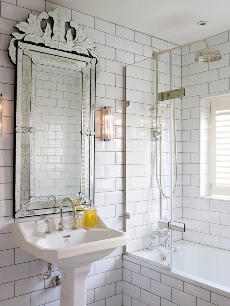 lavish bathroom with large mirror