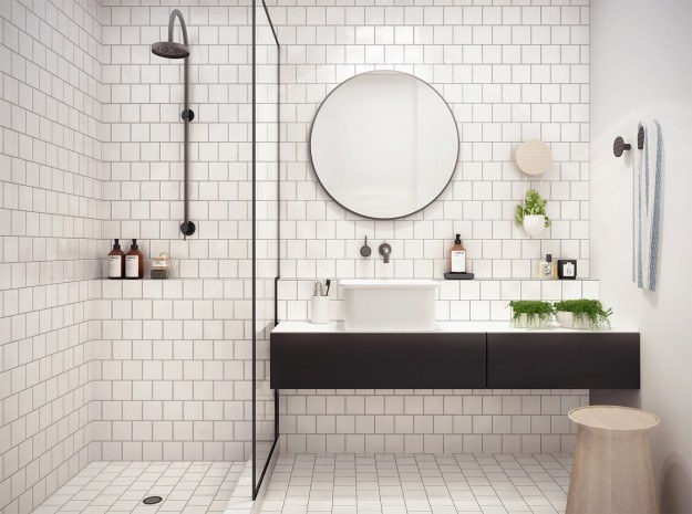 bathroom with tiled wall in shower