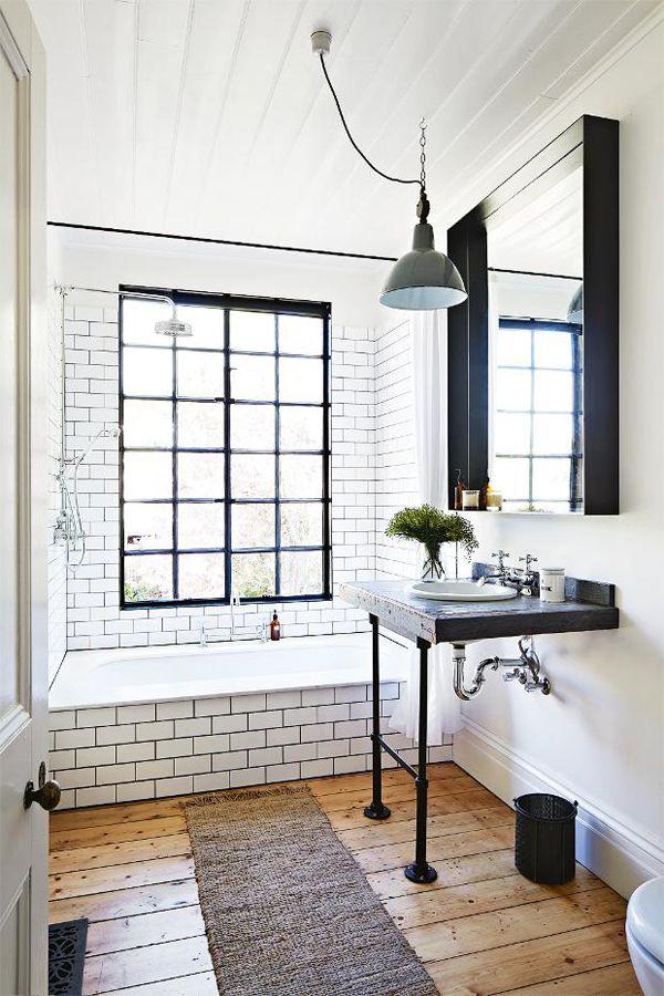 bathroom with white tiled tub