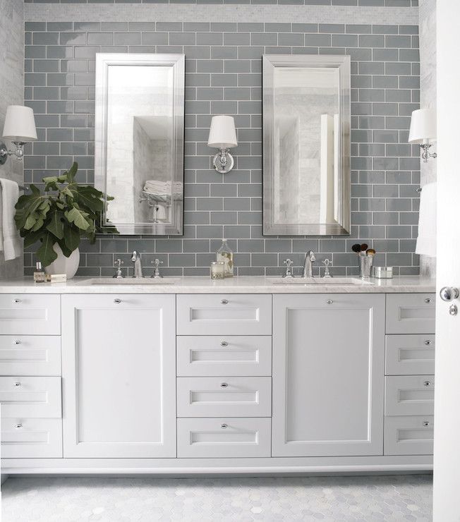 bathroom with gray tile accent wall