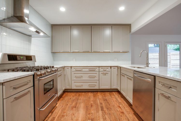 brilliant modern kitchen with clean laminate flooring