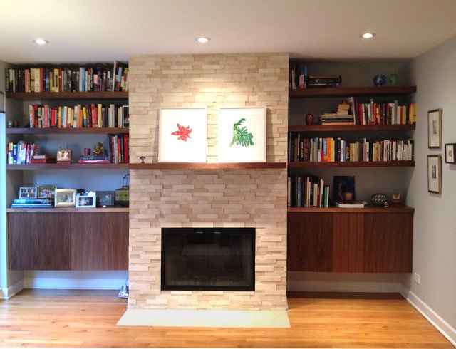 living room with brick fireplace 