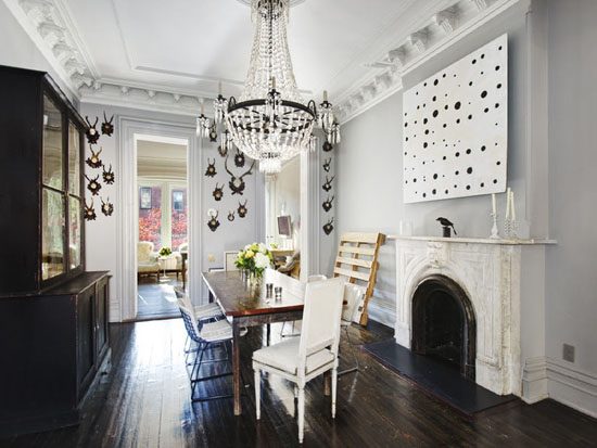 dining room with ornate crown molding