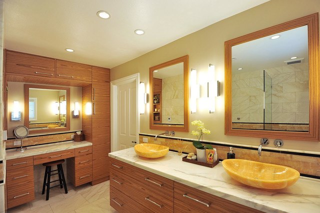 contemporary bathroom with yellow sinks