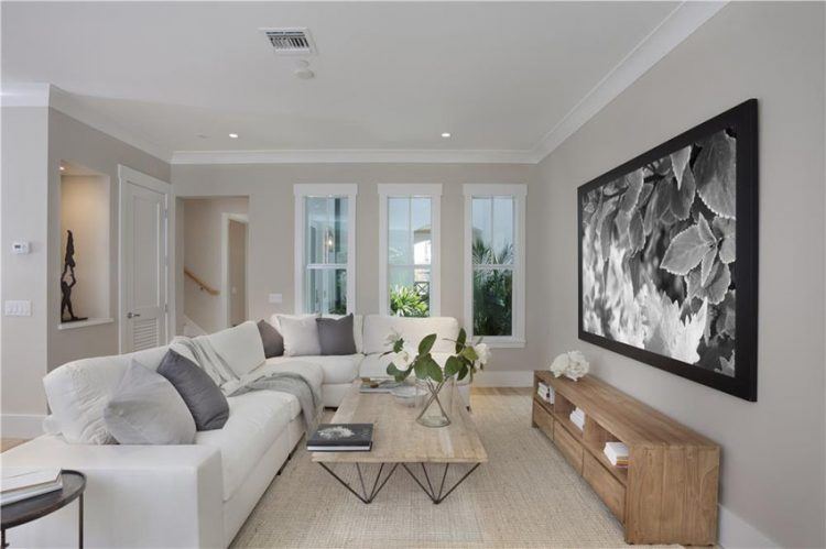 contemporary living room with crown molding