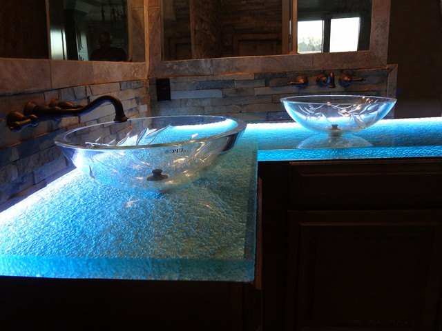 bathroom with two glass sinks