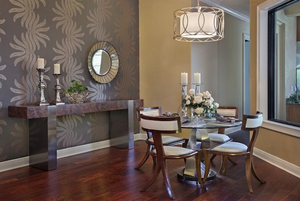 dining room with accent wallpaper