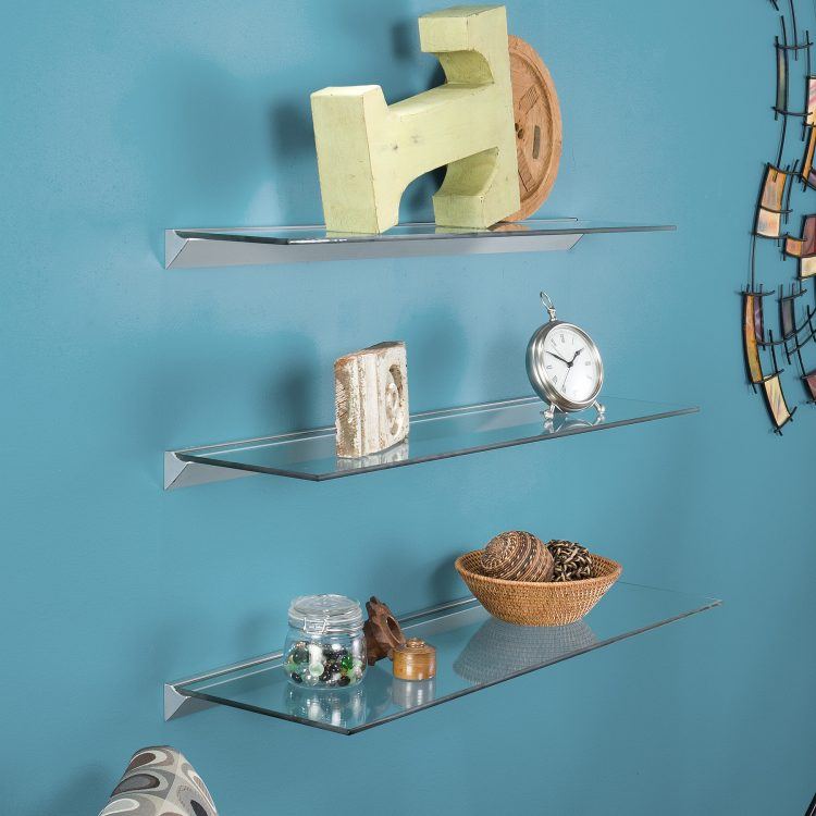 clear glass shelving on blue wall