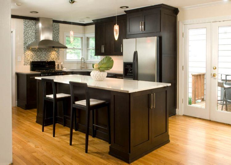 sleek kitchen with espresso cabinets and island