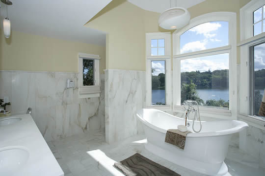 large modern bathroom with a beautiful view