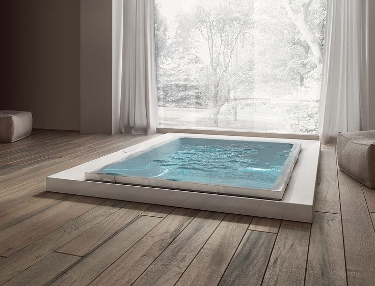 infinity bath tub with wood floor