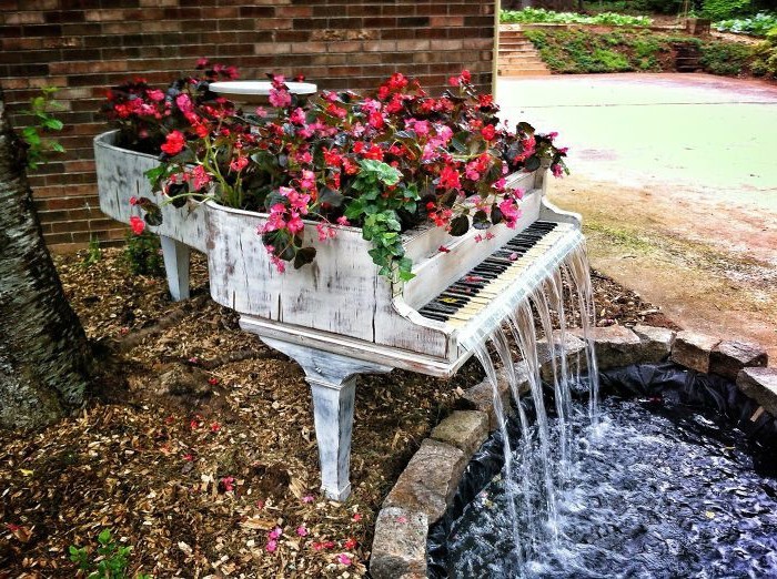 flower bed made in old piano