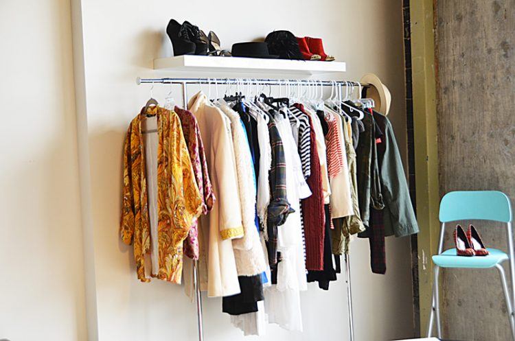 simple closet with floating shelving