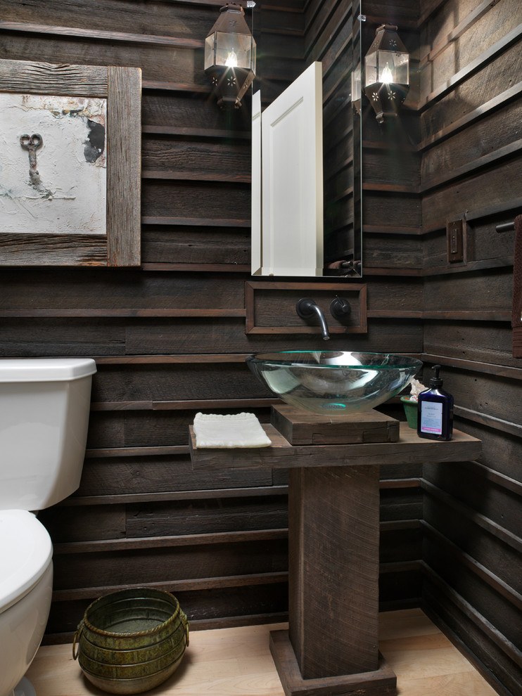 glass vessel sink in rustic bathroom