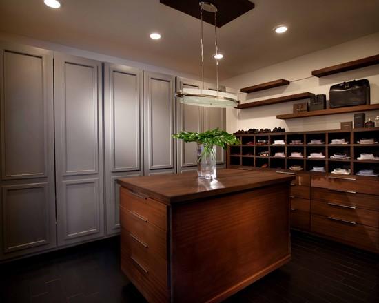 walk in closet with wooden island